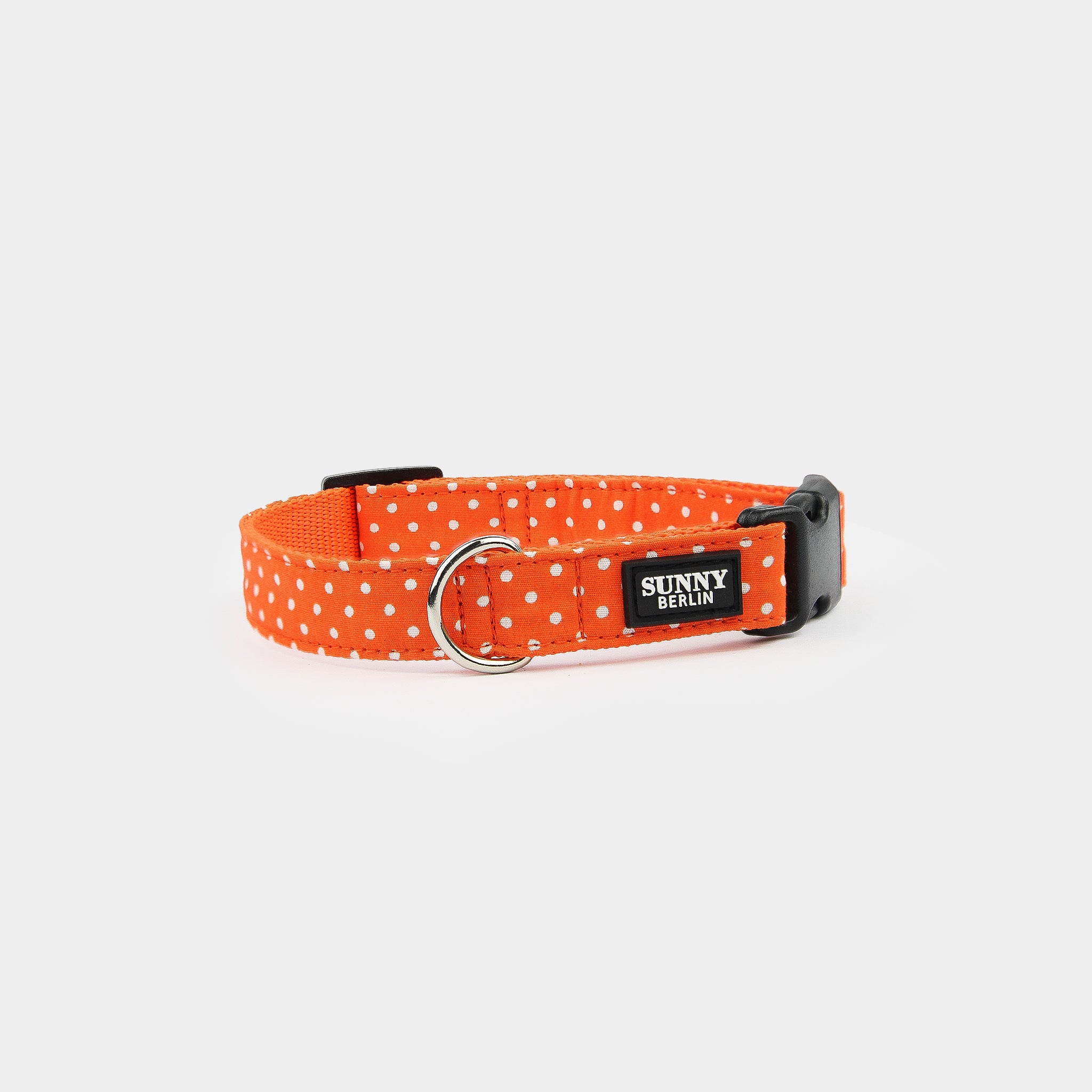 Oranges Hundehalsband mit weißen Punkten