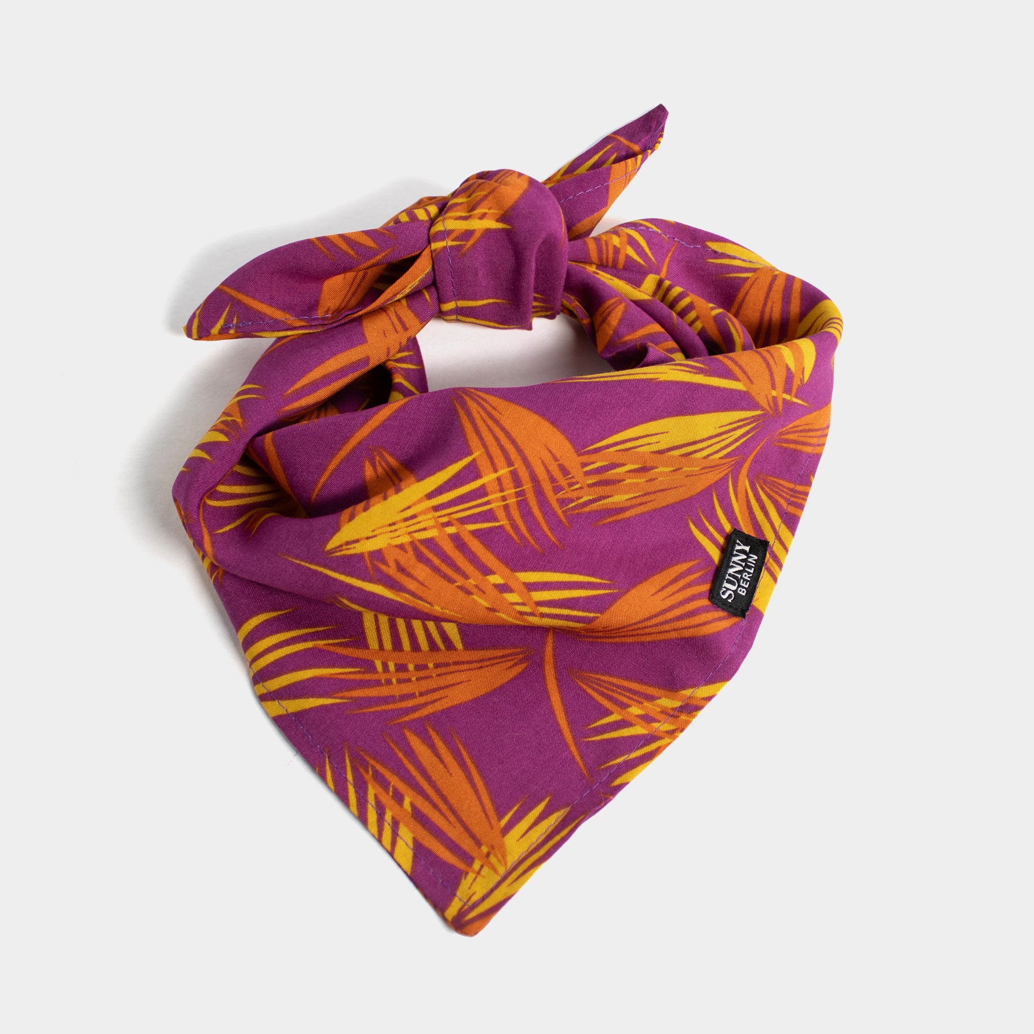 Hundehalsuch mit Tropic Motiv in lila, elb und orange Tönen von Sunny Berlin